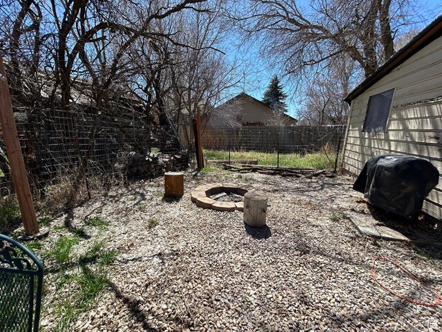 30028 Old Lincoln Hwy, Wanship, UT 84017 - view of yard featuring fence and a fire pit