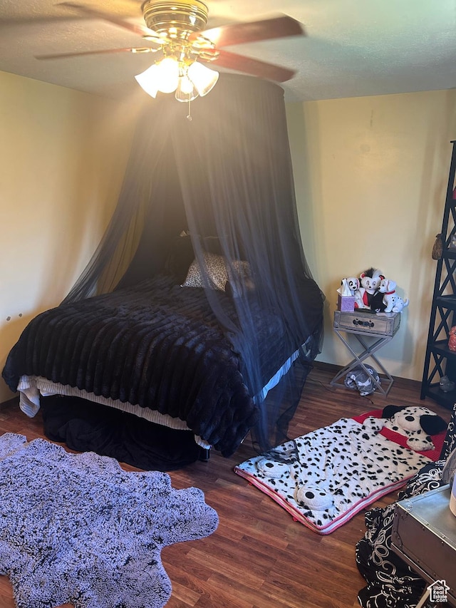 281 E 7th St S, Ogden, UT 84404 - bedroom with wood finished floors and a ceiling fan