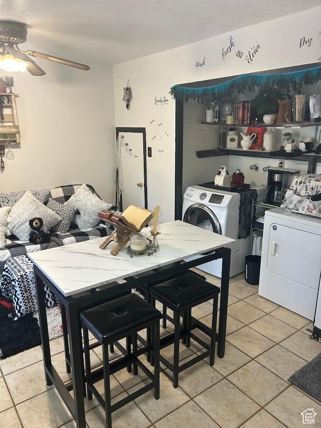 281 E 7th St S, Ogden, UT 84404 - dining room featuring washer / clothes dryer, a textured ceiling, a ceiling fan, and light tile patterned flooring