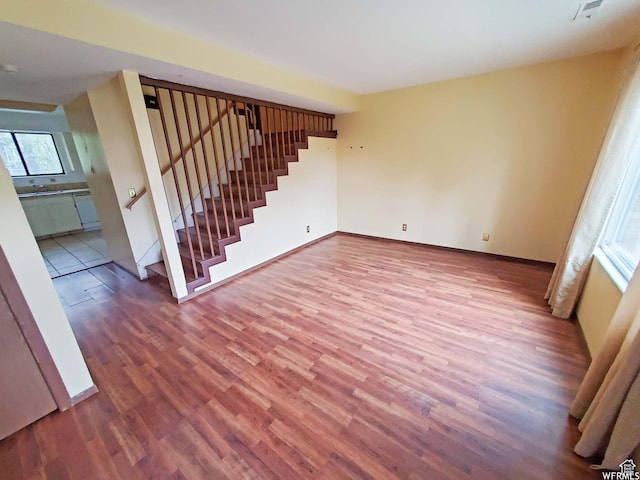281 E 7th St S, Ogden, UT 84404 - interior space with wood finished floors, baseboards, and stairs