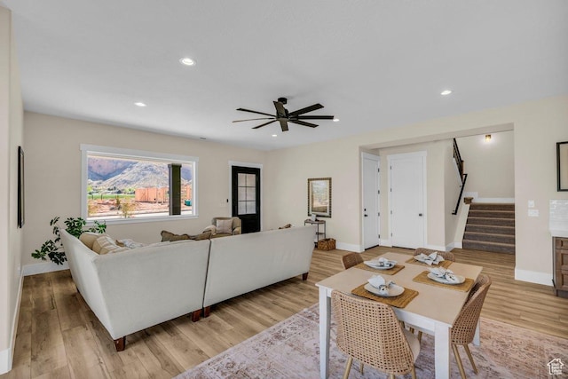 1816 S 920 W, Hurricane, UT 84737 - living room featuring light wood-style floors, baseboards, and stairs