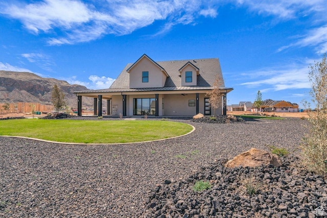 1816 S 920 W, Hurricane, UT 84737 - rear view of property with a yard, a mountain view, and stucco siding