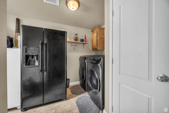 224 E Leadville Rd, Eureka, UT 84628 - washroom with a textured ceiling, light tile patterned flooring, visible vents, laundry area, and washer and dryer