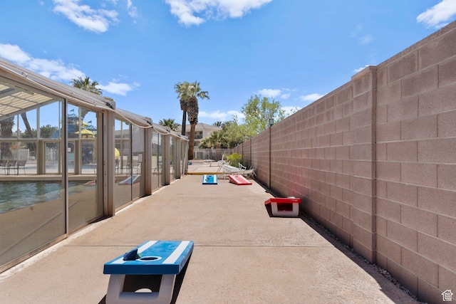 exterior space featuring fence and a patio area