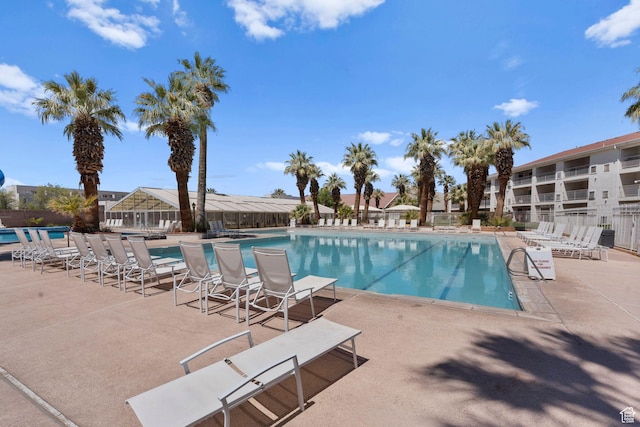 community pool featuring a patio