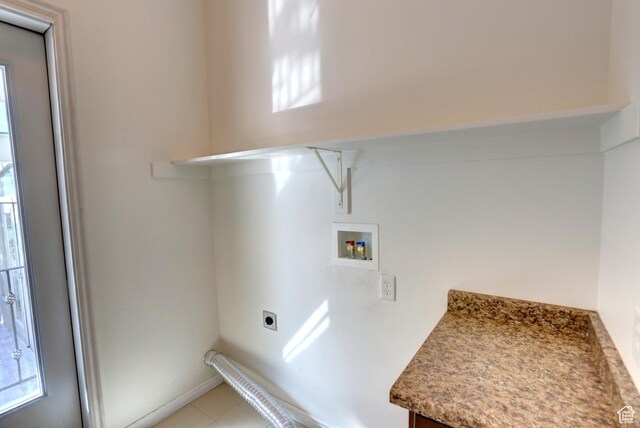 laundry area featuring laundry area, hookup for an electric dryer, and washer hookup