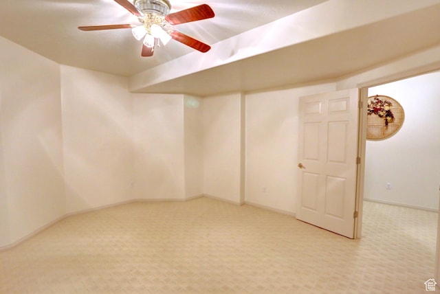 unfurnished room with ceiling fan, baseboards, and carpet floors
