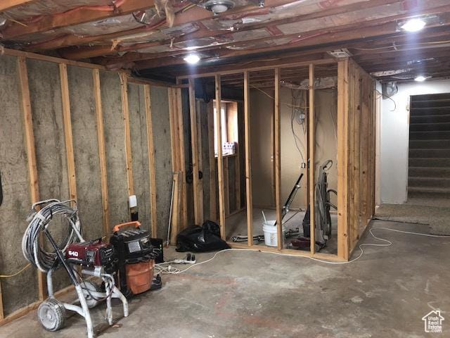 unfinished basement with stairway