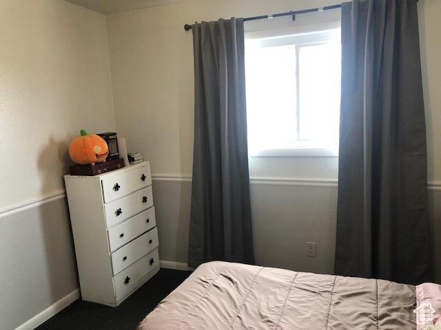 bedroom with baseboards