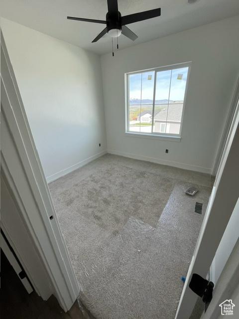 732 S 1140 E, Smithfield, UT 84335 - carpeted spare room featuring a ceiling fan and baseboards