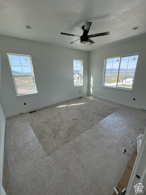 732 S 1140 E, Smithfield, UT 84335 - carpeted empty room with visible vents, a ceiling fan, and baseboards