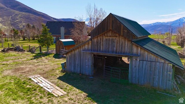 3193 S Southfield Rd W, Daniel, UT 84032 - view of barn with fence and a mountain view