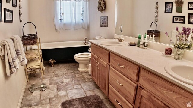 3193 S Southfield Rd W, Daniel, UT 84032 - bathroom with a sink, toilet, stone finish floor, a tub, and double vanity