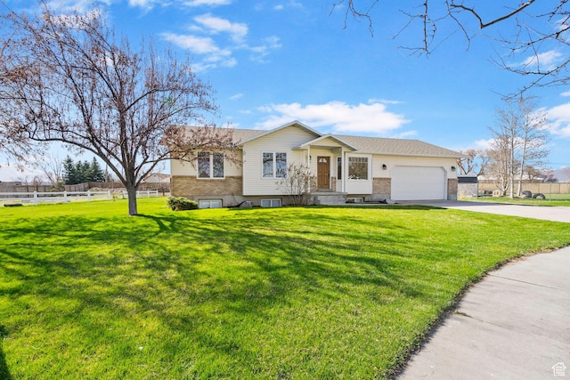 1055 W 325 N, Hyrum, UT 84319 - single story home with an attached garage, driveway, fence, and a front lawn