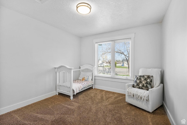 1055 W 325 N, Hyrum, UT 84319 - carpeted bedroom featuring a textured ceiling, baseboards, and a nursery area