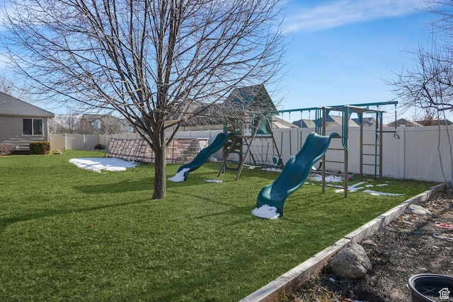 956 S 1525 W, Syracuse, UT 84075 - view of playground with a fenced backyard and a lawn