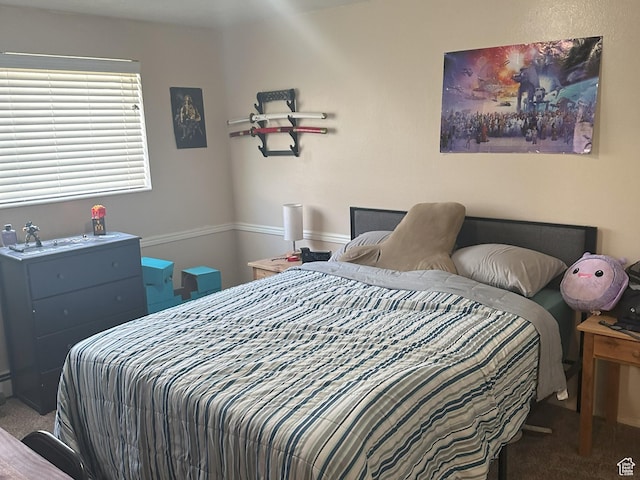 bedroom featuring carpet