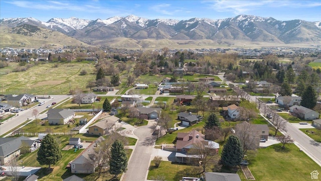 birds eye view of property with a residential view and a mountain view