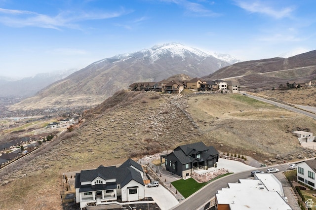 birds eye view of property featuring a mountain view and a residential view