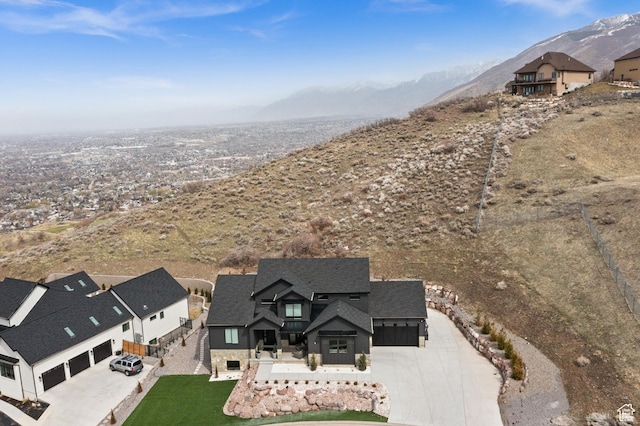 birds eye view of property featuring a residential view and a mountain view