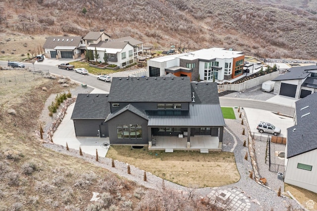 bird's eye view with a residential view and a mountain view