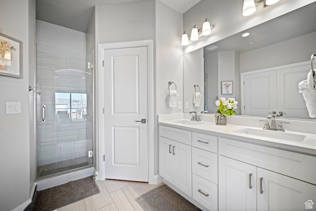 238 N 2020 W # 69, Hurricane, UT 84737 - full bathroom featuring double vanity, a sink, and a stall shower