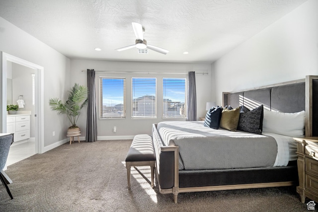 238 N 2020 W # 69, Hurricane, UT 84737 - bedroom featuring baseboards, ceiling fan, recessed lighting, ensuite bath, and light carpet