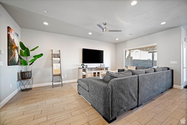 238 N 2020 W # 69, Hurricane, UT 84737 - living area featuring light wood-style floors, baseboards, a ceiling fan, and recessed lighting