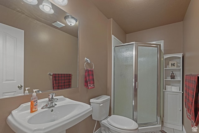 155 S Last Chance Dr, Laketown, UT 84038 - bathroom with a shower stall, a sink, and toilet