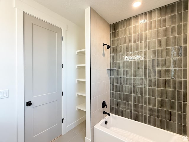 full bath featuring tile patterned floors, recessed lighting, baseboards, and shower / bathtub combination