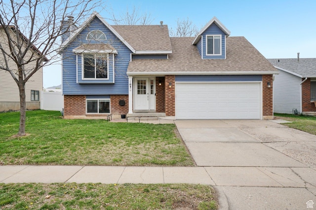 tri-level home with concrete driveway, a front lawn, a shingled roof, an attached garage, and brick siding