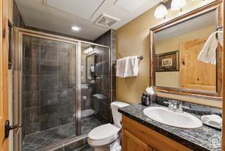 2669 Canyons Resort Dr Unit 207, Park City, UT 84098 - full bath with visible vents, toilet, a shower stall, recessed lighting, and vanity