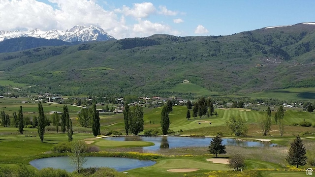 3615 N Wolf Lodge Dr Unit 211, Eden, UT 84310 - view of property's community with a water and mountain view and view of golf course