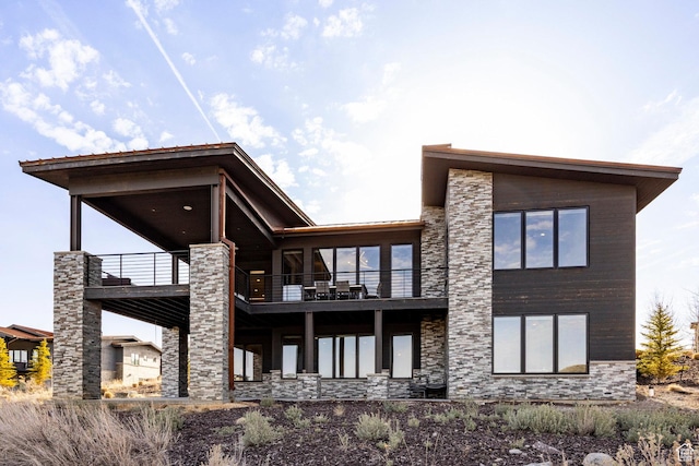 6633 Golden Bear Loop W, Park City, UT 84098 - back of house featuring stone siding and a balcony