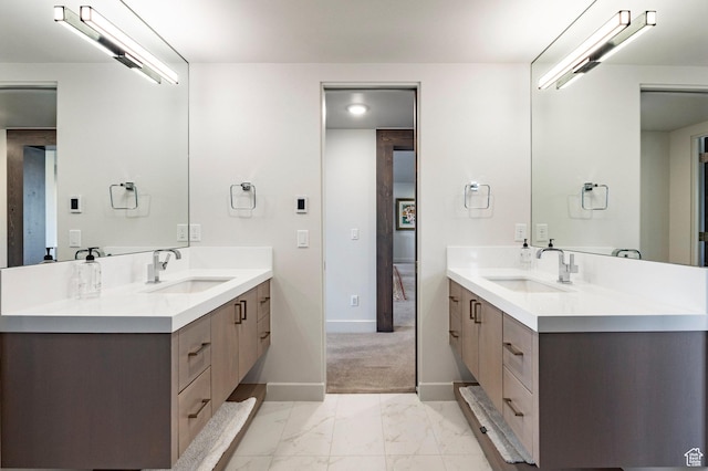 6633 Golden Bear Loop W, Park City, UT 84098 - bathroom with baseboards, two vanities, a sink, and marble finish floor