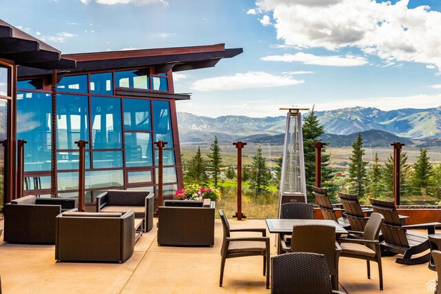 6633 Golden Bear Loop W, Park City, UT 84098 - view of patio featuring an outdoor hangout area, a mountain view, and outdoor dining area