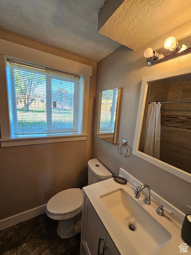 3500 W 6875 S, West Jordan, UT 84084 - bathroom with plenty of natural light, a textured ceiling, curtained shower, toilet, and vanity