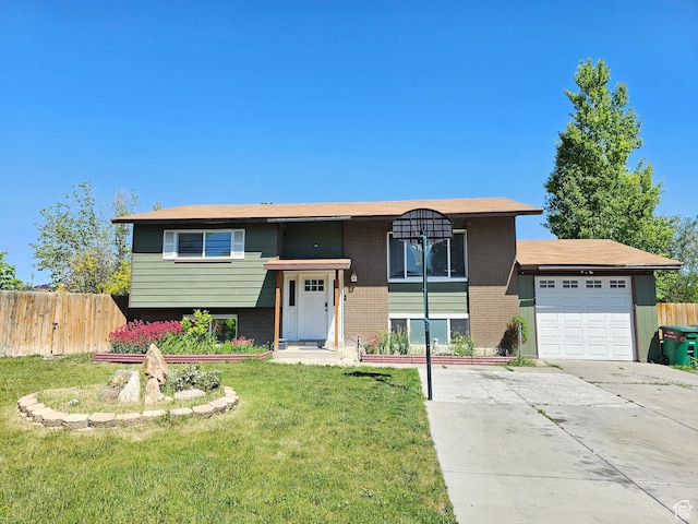 3500 W 6875 S, West Jordan, UT 84084 - view of front of home with an attached garage, brick siding, and driveway