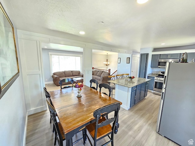 3500 W 6875 S, West Jordan, UT 84084 - dining room featuring light wood finished floors and recessed lighting