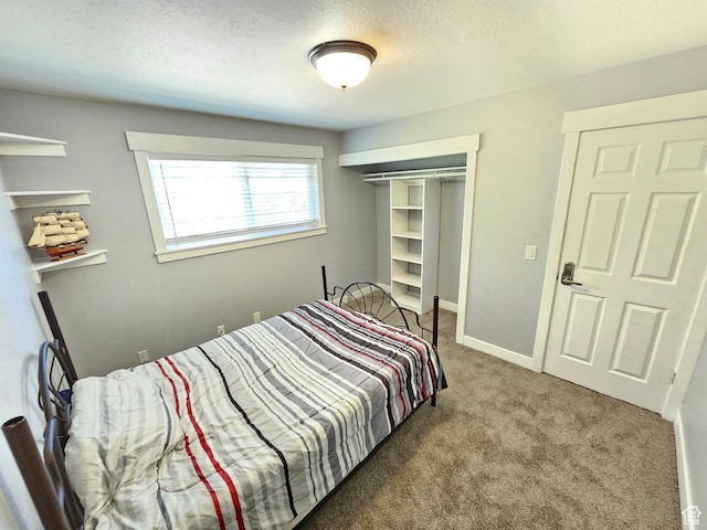 3500 W 6875 S, West Jordan, UT 84084 - carpeted bedroom featuring a closet, a textured ceiling, and baseboards