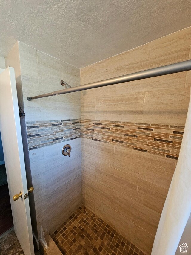 3500 W 6875 S, West Jordan, UT 84084 - bathroom featuring a shower stall and a textured ceiling