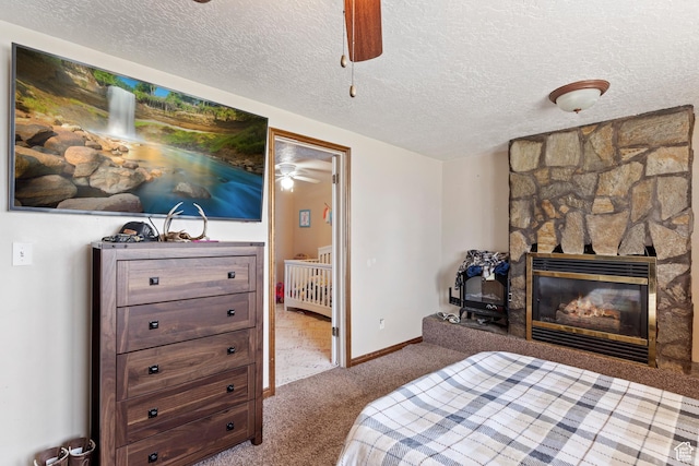 4710 W 2200 N, Plain City, UT 84404 - carpeted bedroom with a fireplace, a textured ceiling, and baseboards