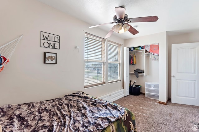 4710 W 2200 N, Plain City, UT 84404 - bedroom with baseboards, a closet, a ceiling fan, and carpet floors