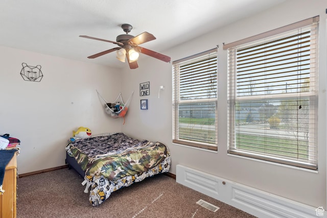 4710 W 2200 N, Plain City, UT 84404 - bedroom with carpet flooring, visible vents, baseboards, and ceiling fan