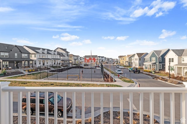 balcony featuring a residential view