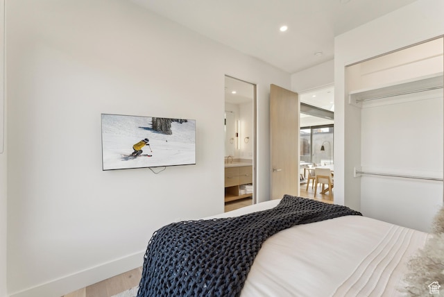 3595 Ridgeline Dr, Park City, UT 84098 - bedroom with recessed lighting, ensuite bath, baseboards, and wood finished floors