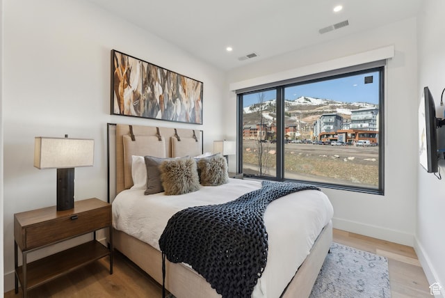 3595 Ridgeline Dr, Park City, UT 84098 - bedroom featuring recessed lighting, visible vents, baseboards, and wood finished floors