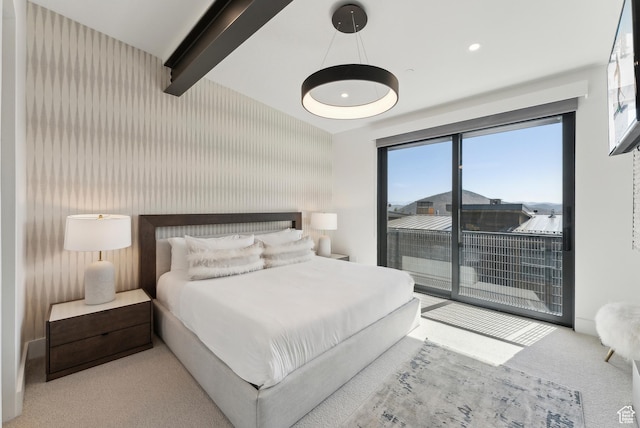 3595 Ridgeline Dr, Park City, UT 84098 - bedroom featuring multiple windows, access to exterior, beam ceiling, and carpet floors