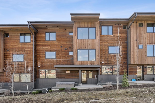 3595 Ridgeline Dr, Park City, UT 84098 - rear view of house featuring a patio area and a hot tub