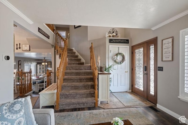 8366 S Cobble Cir W, West Jordan, UT 84081 - foyer entrance featuring wood finished floors, stairs, ornamental molding, and plenty of natural light